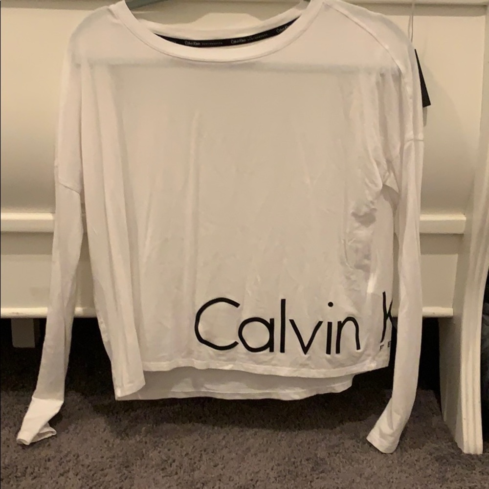 White Calvin Klein performance long sleeve top
